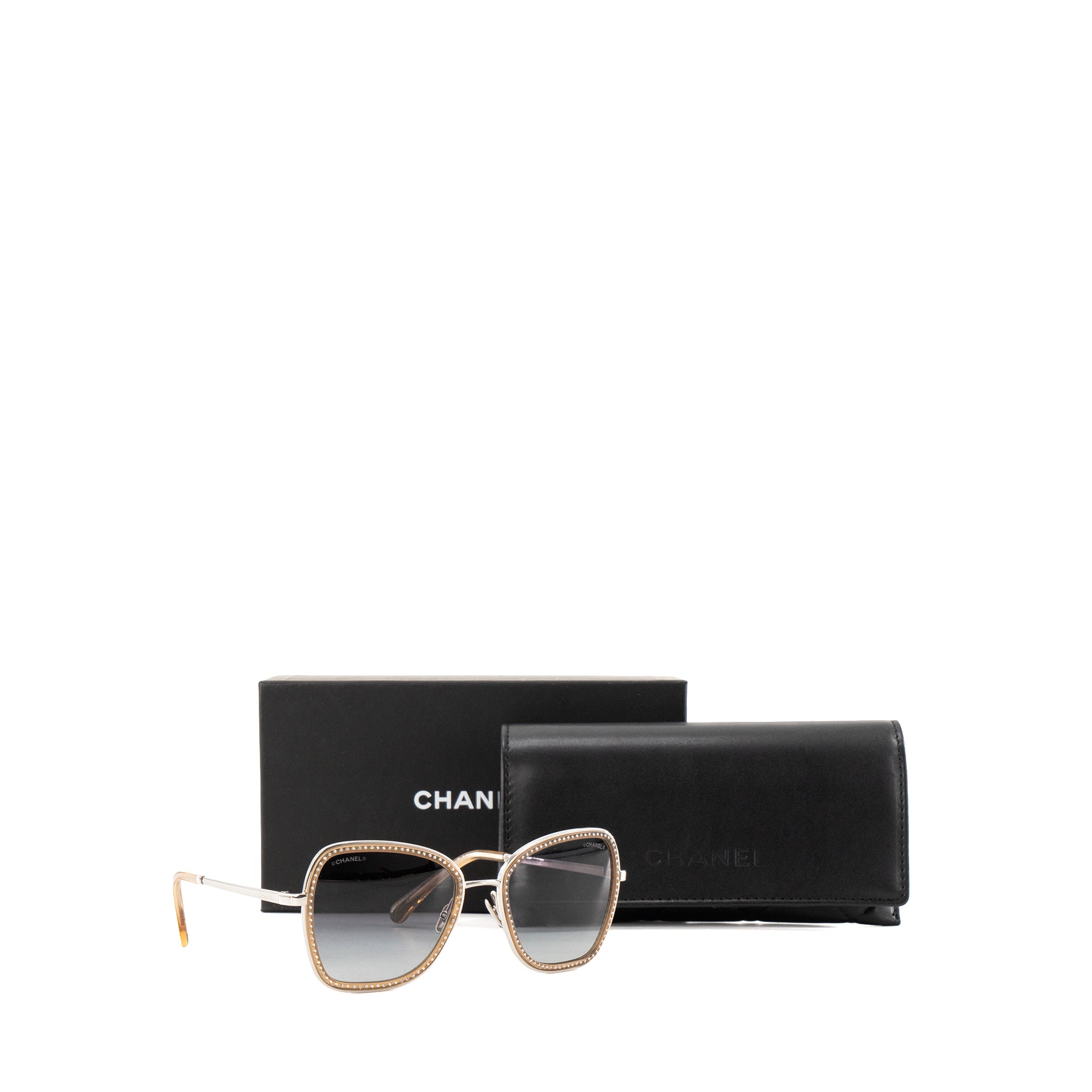 CHANEL - Lunettes de soleil Chanel en métal argenté et strass