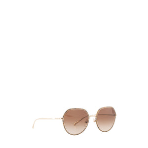 CHANEL - Lunettes de soleil Chanel en métal doré