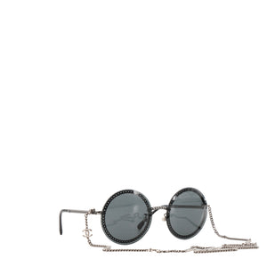 CHANEL - Lunettes de soleil Chanel en métal noir