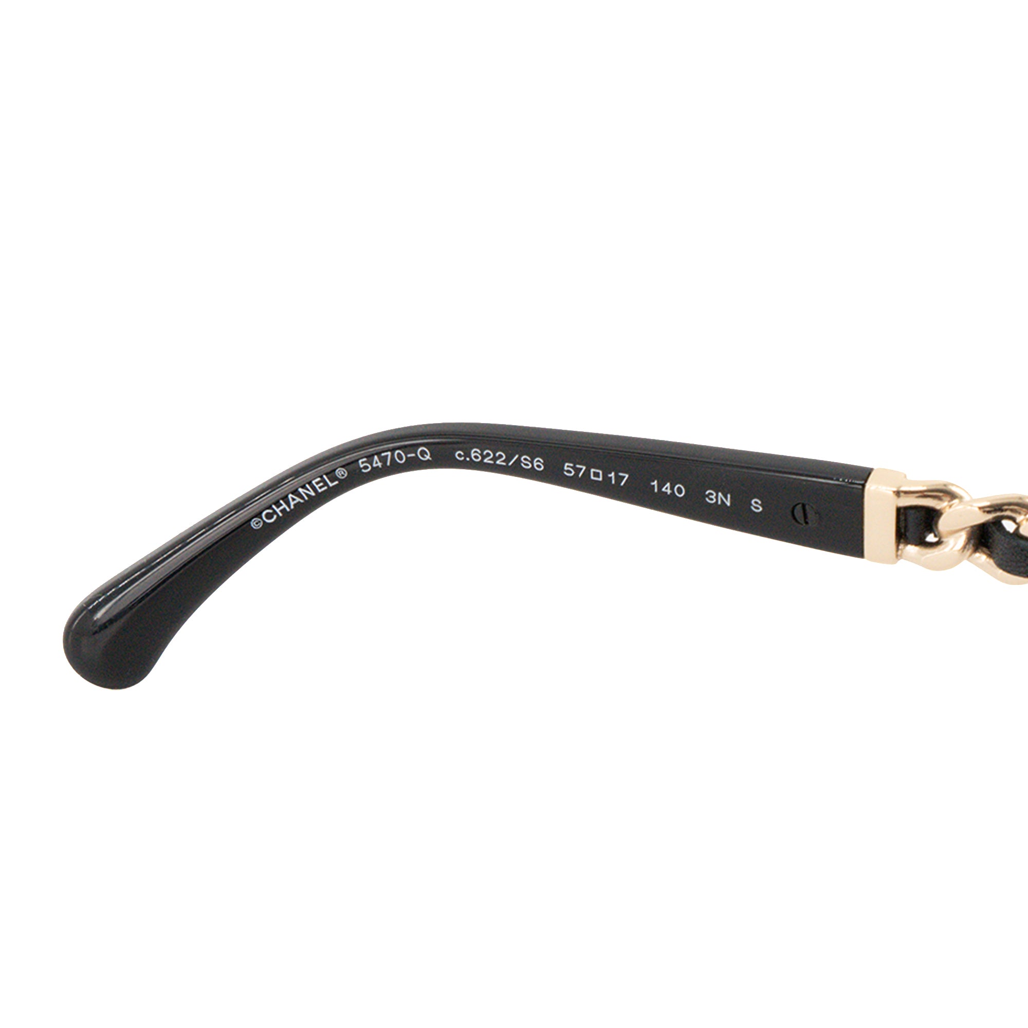CHANEL - Lunettes de soleil Chanel en plastique et cuir noir et doré