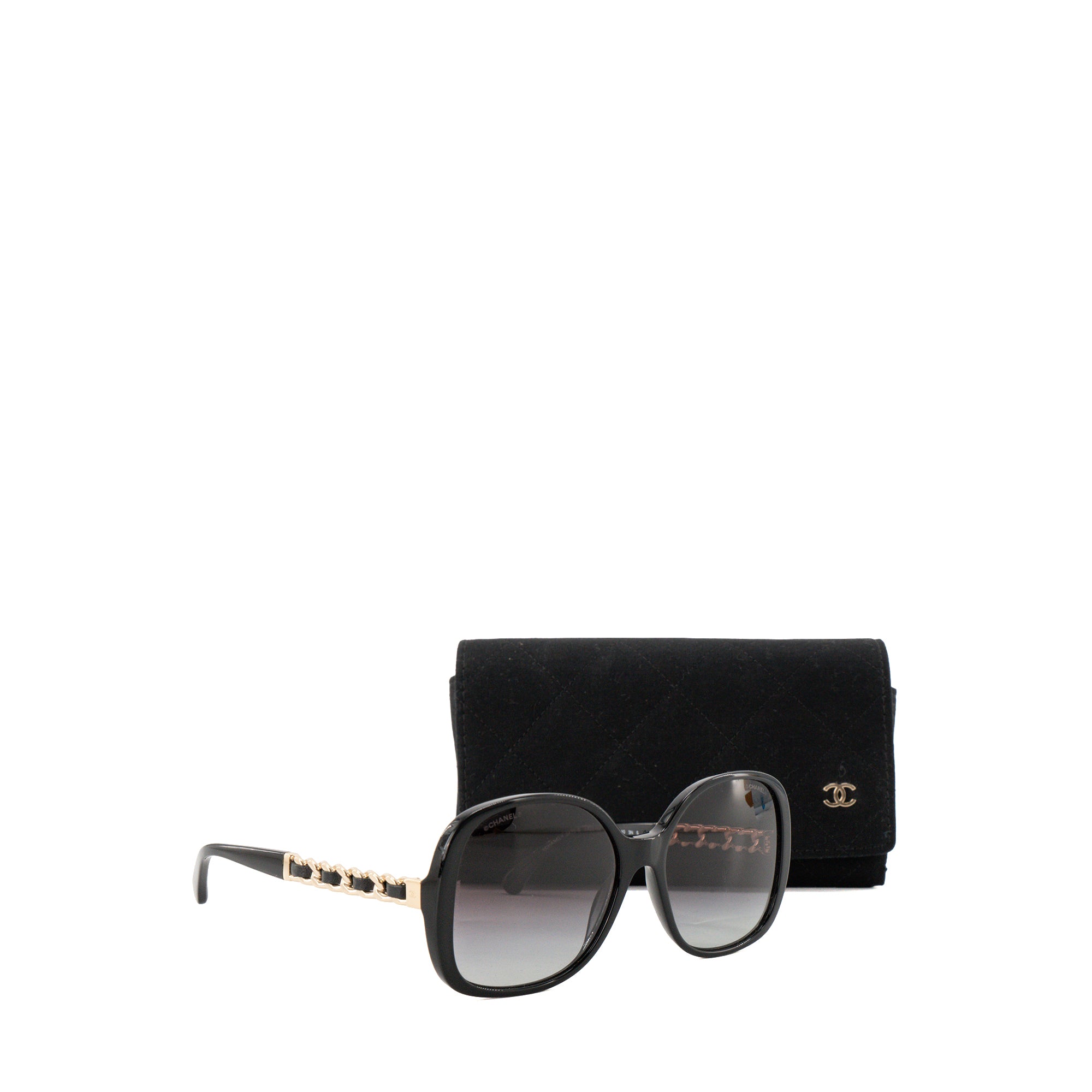 CHANEL - Lunettes de soleil Chanel en plastique et cuir noir et doré