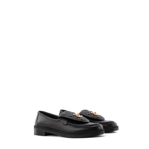 CHANEL - Mocassins CC Chanel en cuir noir (T39.5)