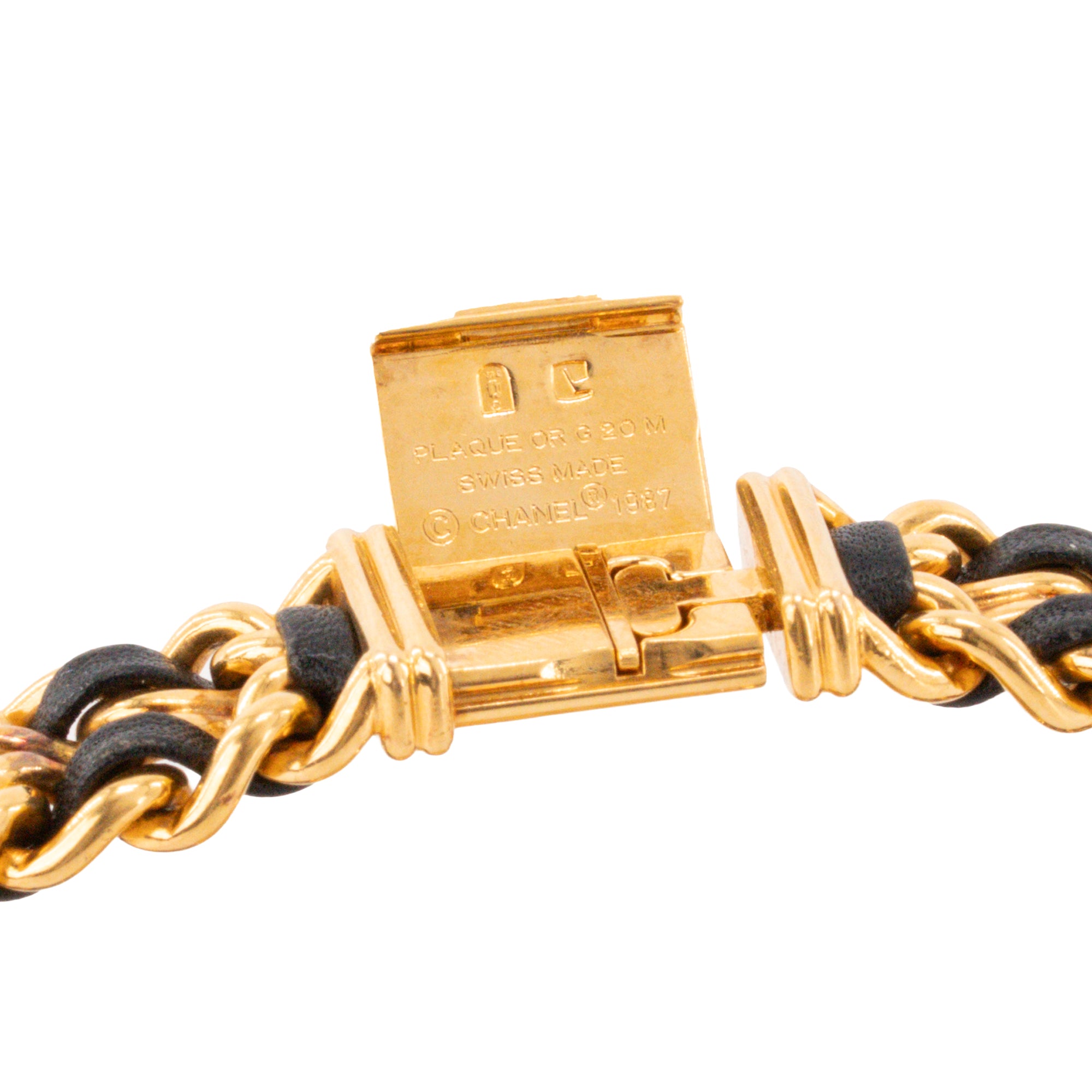 CHANEL - Montre Première Chanel en plaqué or et cuir noir (S)
