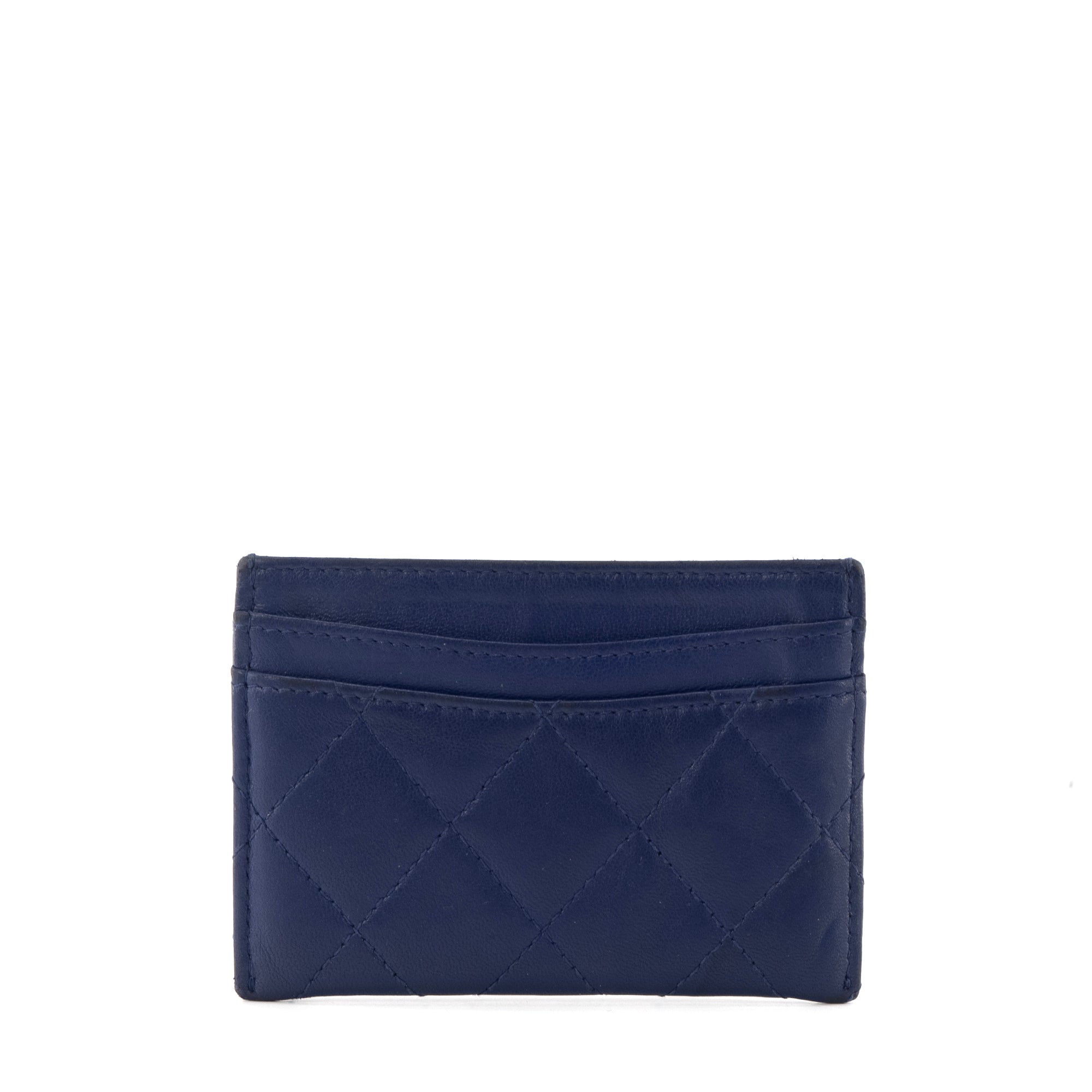 CHANEL - Porte cartes Chanel en cuir matelassé lisse bleu marine édition limitée