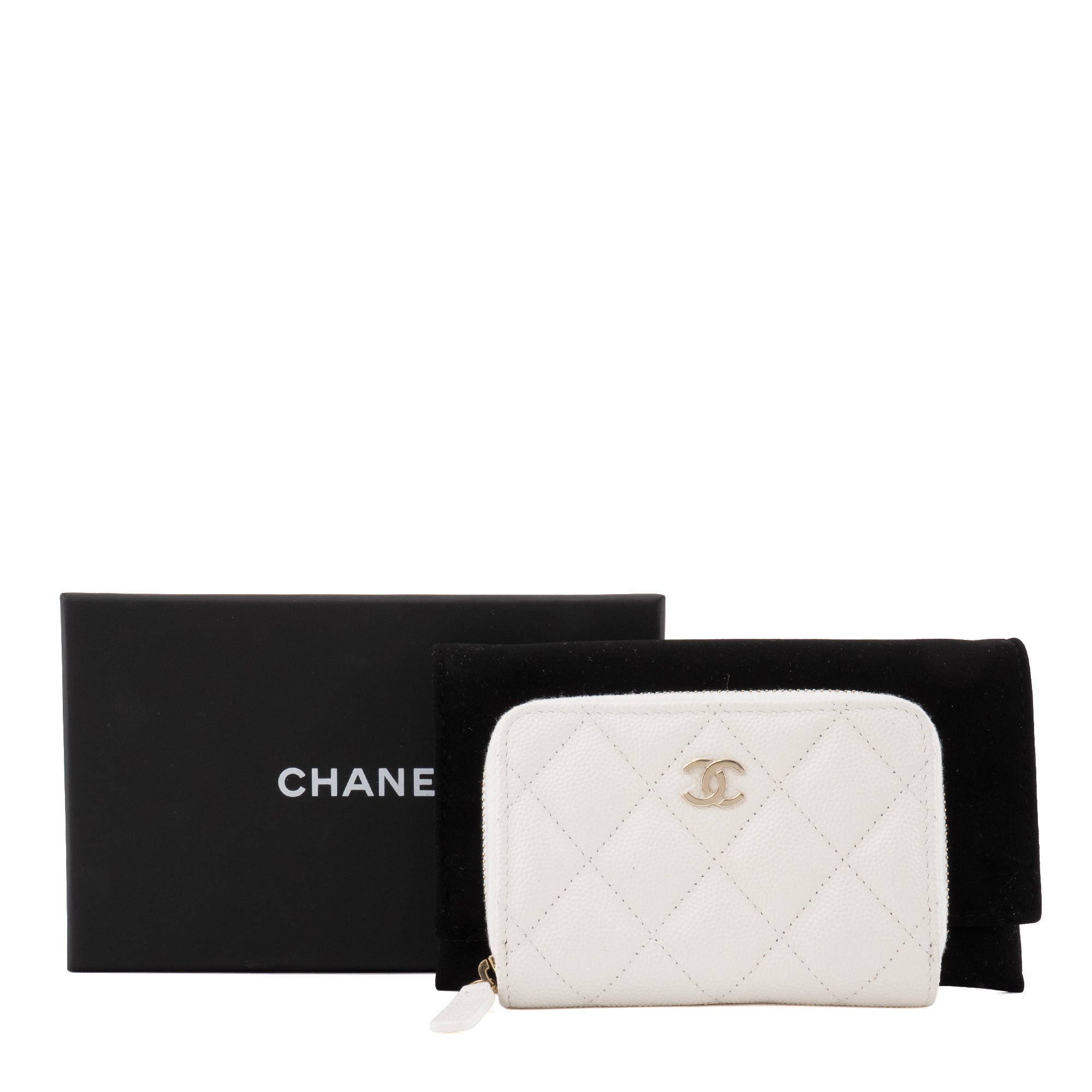 CHANEL - Porte-monnaie Zippé Classique/Timeless Chanel en cuir caviar blanc