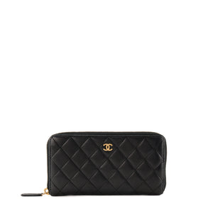 CHANEL - Portefeuille long Classique/Timeless Chanel en cuir lisse noir