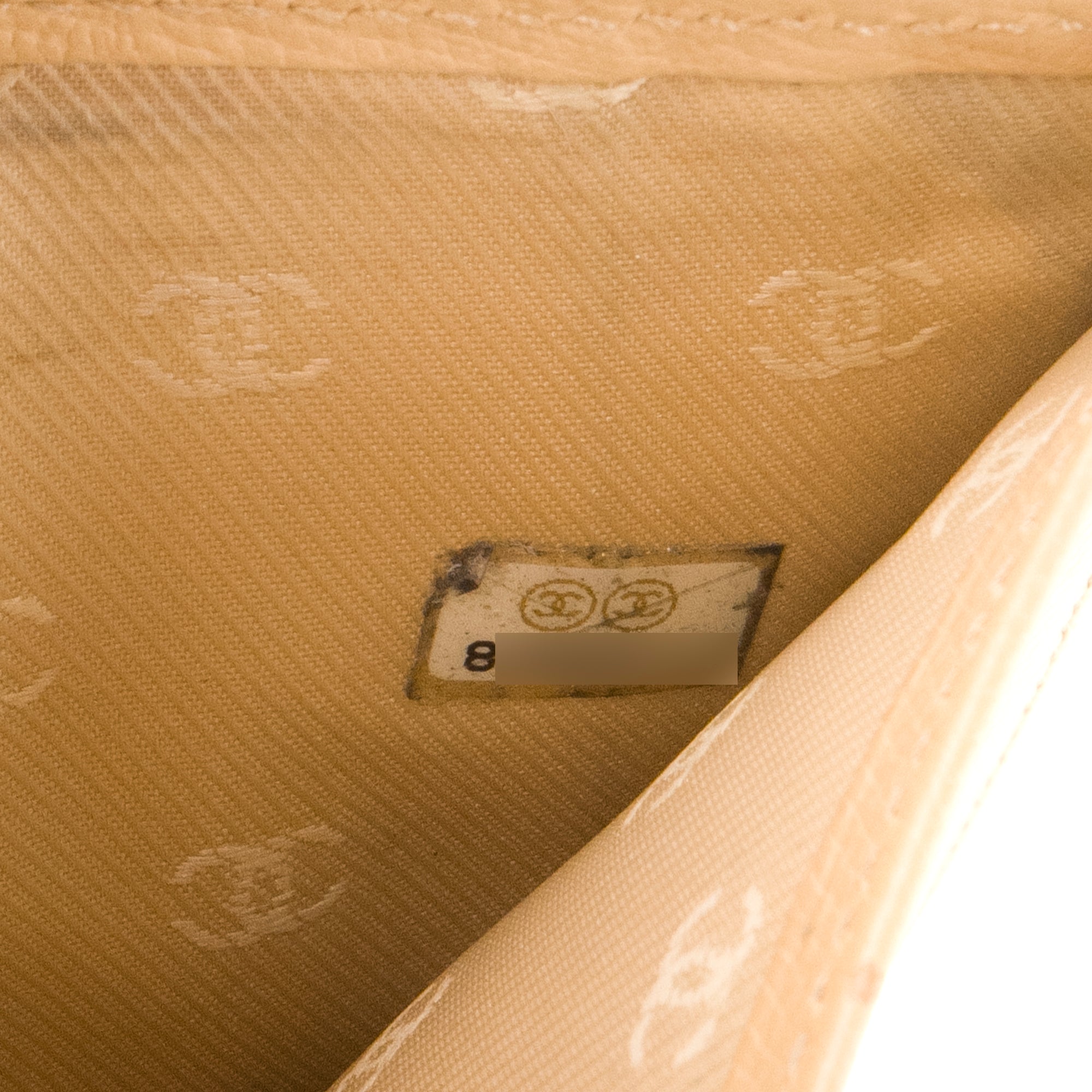 CHANEL - Portefeuille Chanel en cuir grainé beige vintage