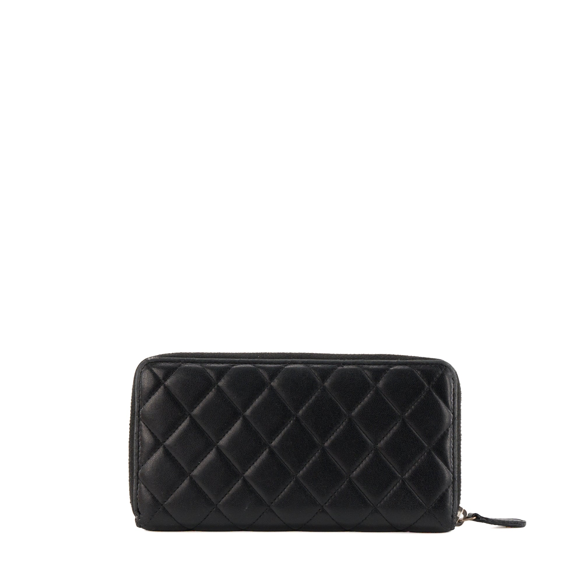 CHANEL - Portefeuille long Classique/Timeless Chanel en cuir lisse noir