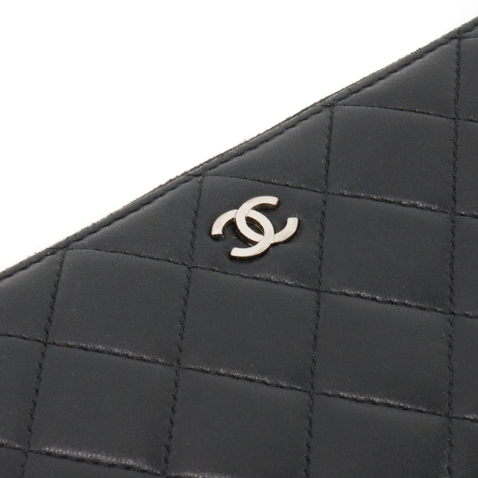 CHANEL - Portefeuille long Classique/Timeless Chanel en cuir lisse noir