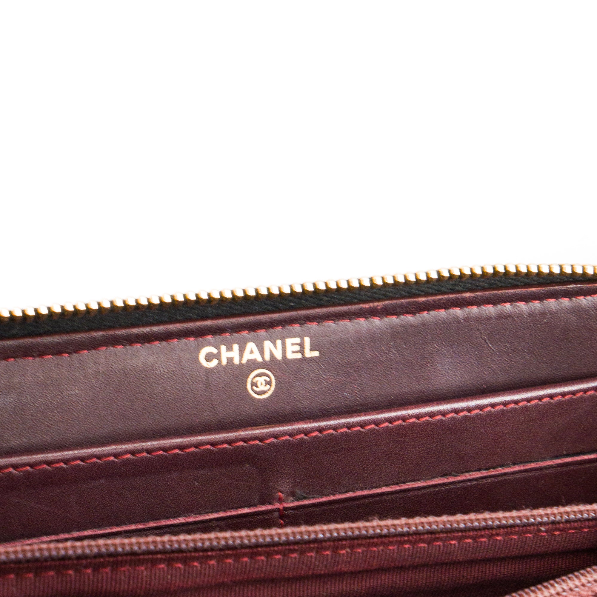 CHANEL - Portefeuille Classique/Timeless Zippé Chanel en cuir caviar noir