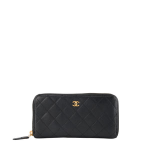 CHANEL - Portefeuille Classique/Timeless Zippé Chanel en cuir caviar noir
