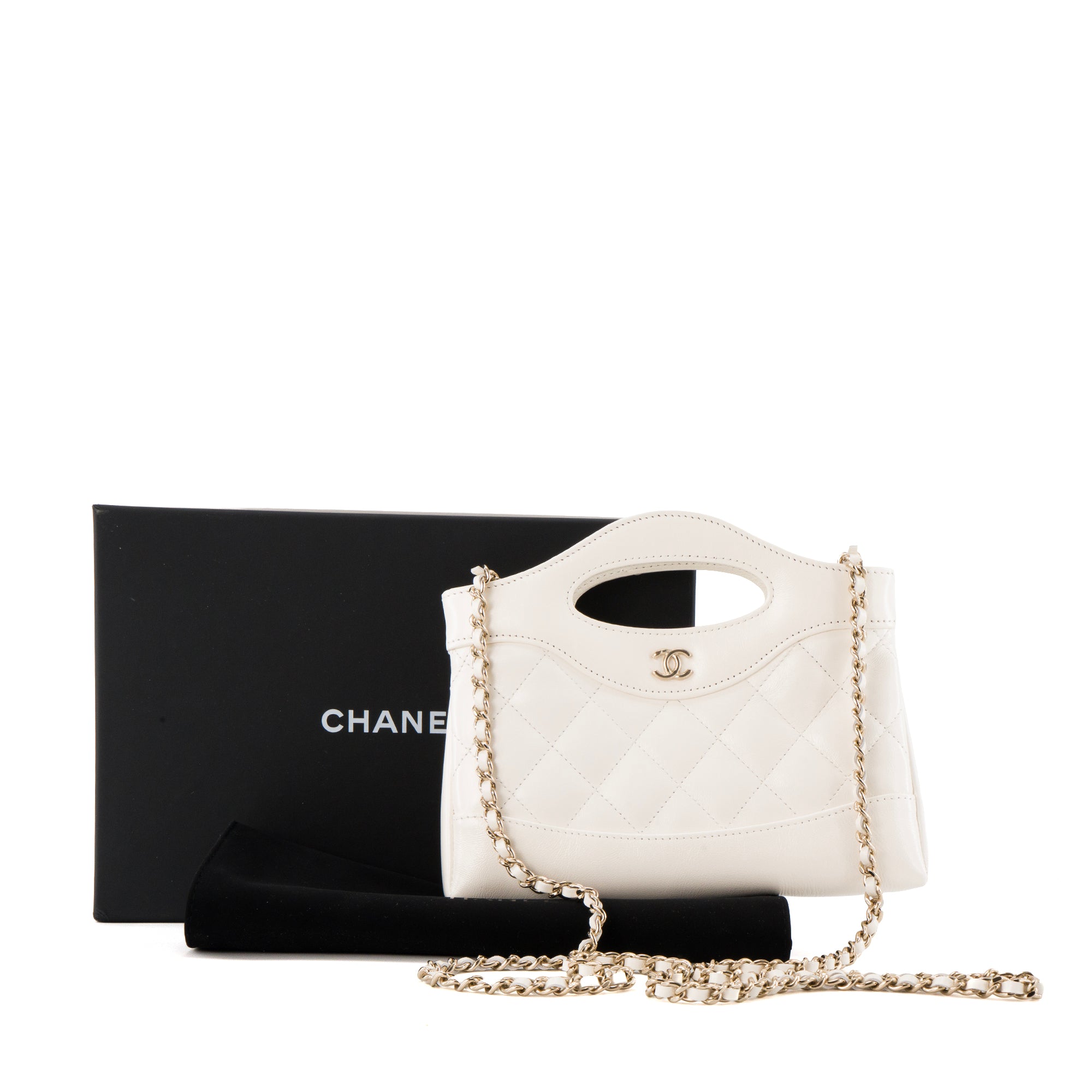 CHANEL - Sac à bandoulière Chanel 31 en cuir lisse blanc