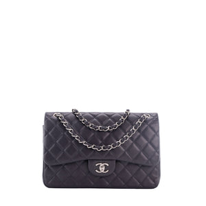 CHANEL - Sac à bandoulière Classique/Timeless Jumbo Chanel en cuir caviar bleu marine