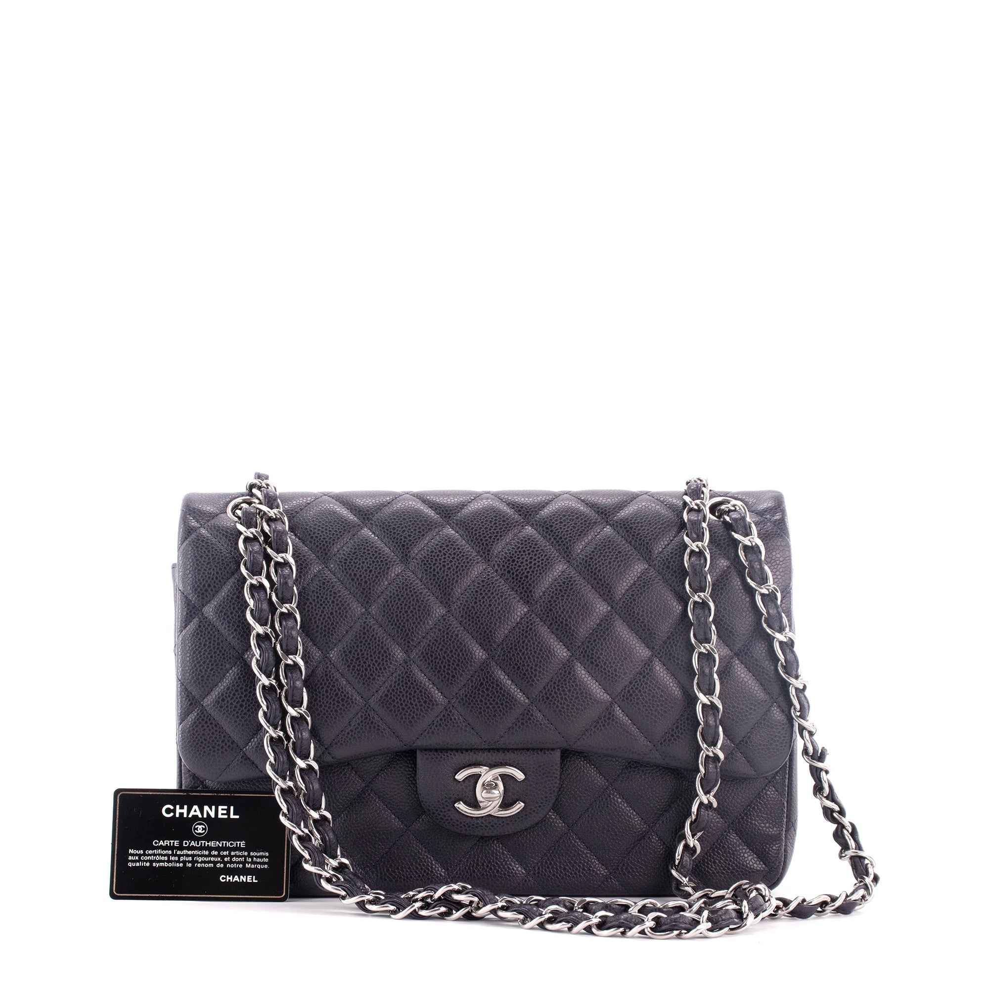 CHANEL - Sac à bandoulière Classique/Timeless Jumbo Chanel en cuir caviar bleu marine