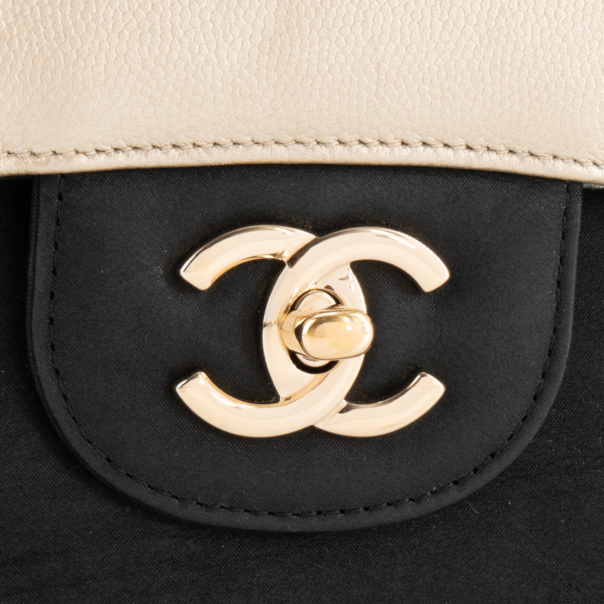 CHANEL - Jumbo bicolour black and gold caviar leather bag
