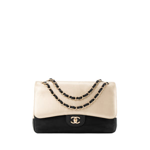 CHANEL - Jumbo bicolour black and gold caviar leather bag