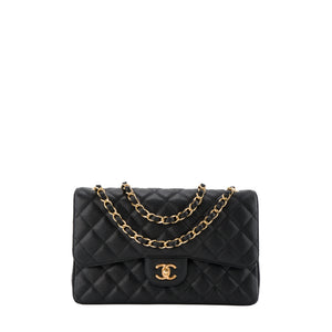 CHANEL - Sac à bandoulière Classique/Timeless Jumbo Chanel en cuir caviar noir