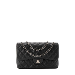 CHANEL - Sac à bandoulière Classique/Timeless Jumbo Chanel en cuir caviar noir
