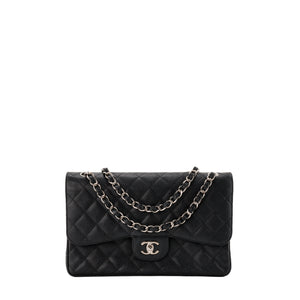 CHANEL - Sac à bandoulière Classique/Timeless Jumbo Chanel en cuir caviar noir