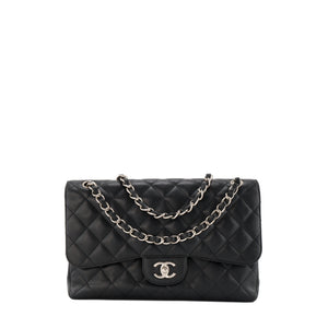 CHANEL - Sac à bandoulière Classique/Timeless Jumbo Chanel en cuir caviar noir