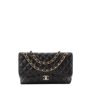 CHANEL - Sac à bandoulière Classique/Timeless Jumbo Chanel en cuir caviar noir