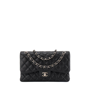 CHANEL - Sac à bandoulière Classique/Timeless Jumbo Chanel en cuir caviar noir