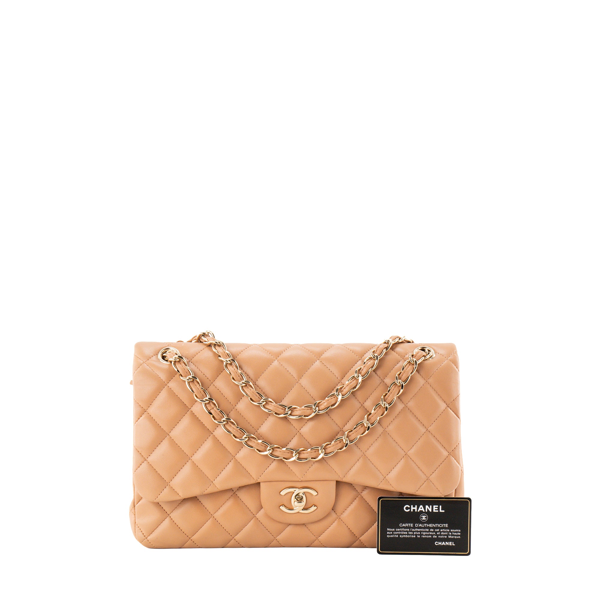 CHANEL - Sac à bandoulière Classique/Timeless Jumbo Chanel en cuir lisse beige