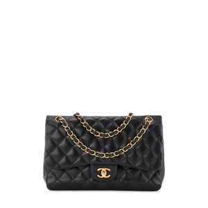 CHANEL - Sac à bandoulière Classique/Timeless Jumbo Chanel en cuir lisse noir