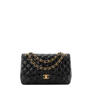 CHANEL - Sac à bandoulière Classique/Timeless Jumbo Chanel en cuir lisse noir
