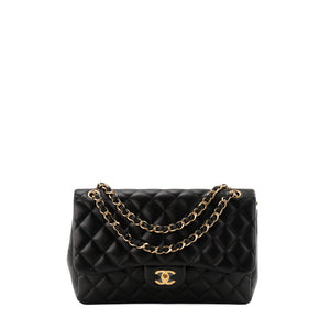 CHANEL - Sac à bandoulière Classique/Timeless Jumbo Chanel en cuir lisse noir