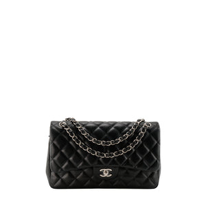 CHANEL - Sac à bandoulière Classique/Timeless Jumbo Chanel en cuir lisse noir