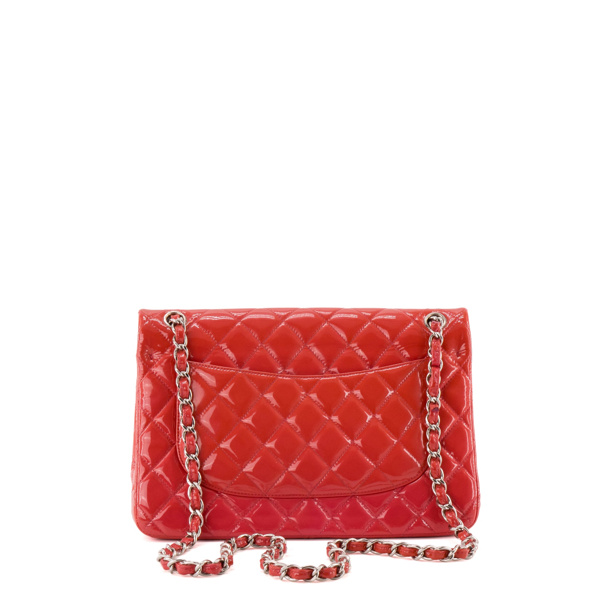 CHANEL - Sac à bandoulière Classique/Timeless Jumbo Chanel en cuir verni rose