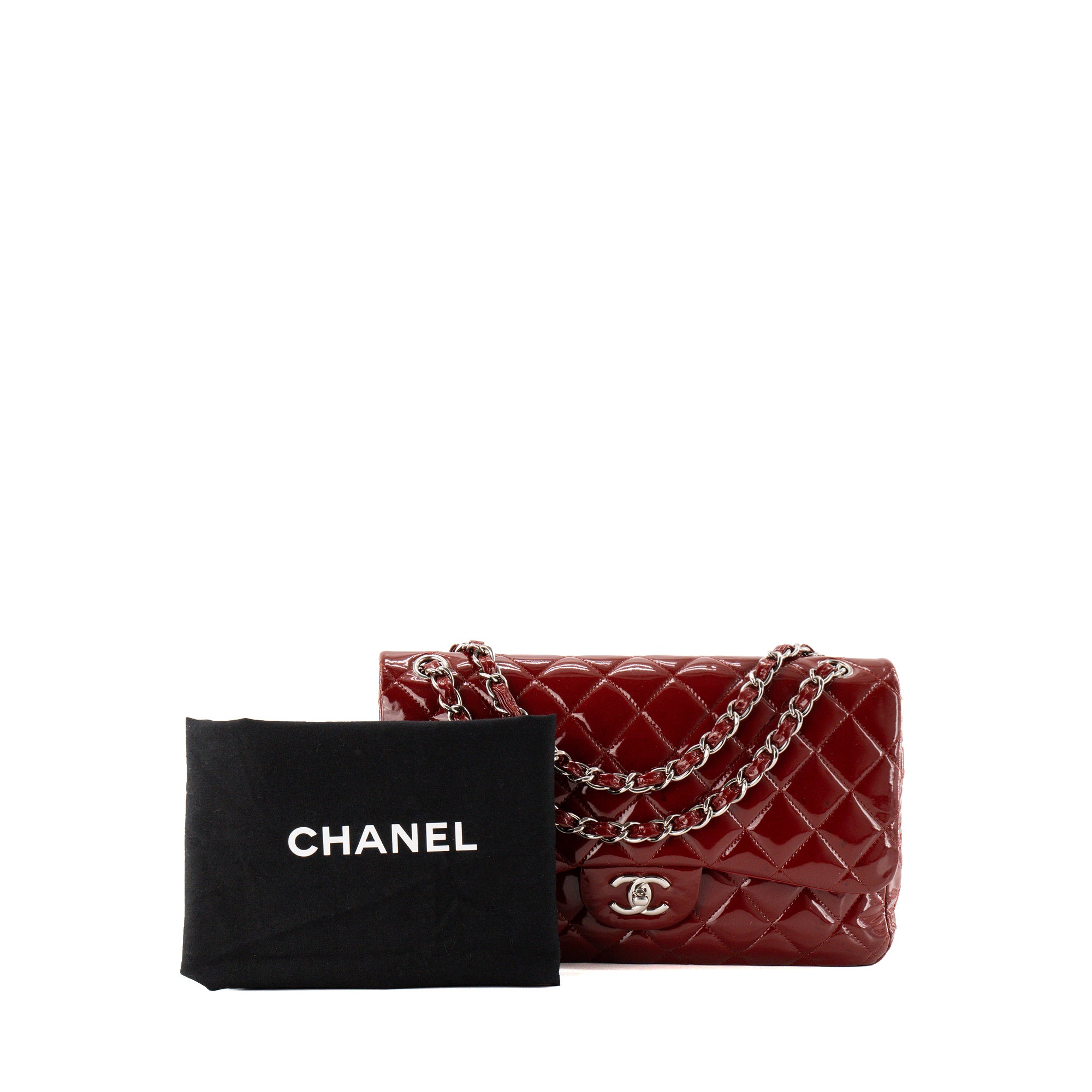 CHANEL - Sac à bandoulière Classique/Timeless Jumbo Chanel en cuir verni bordeaux