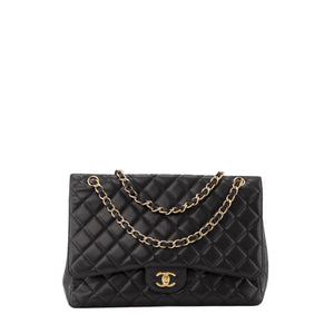 CHANEL - Sac à bandoulière Classique/Timeless Maxi Jumbo Chanel en cuir caviar noir