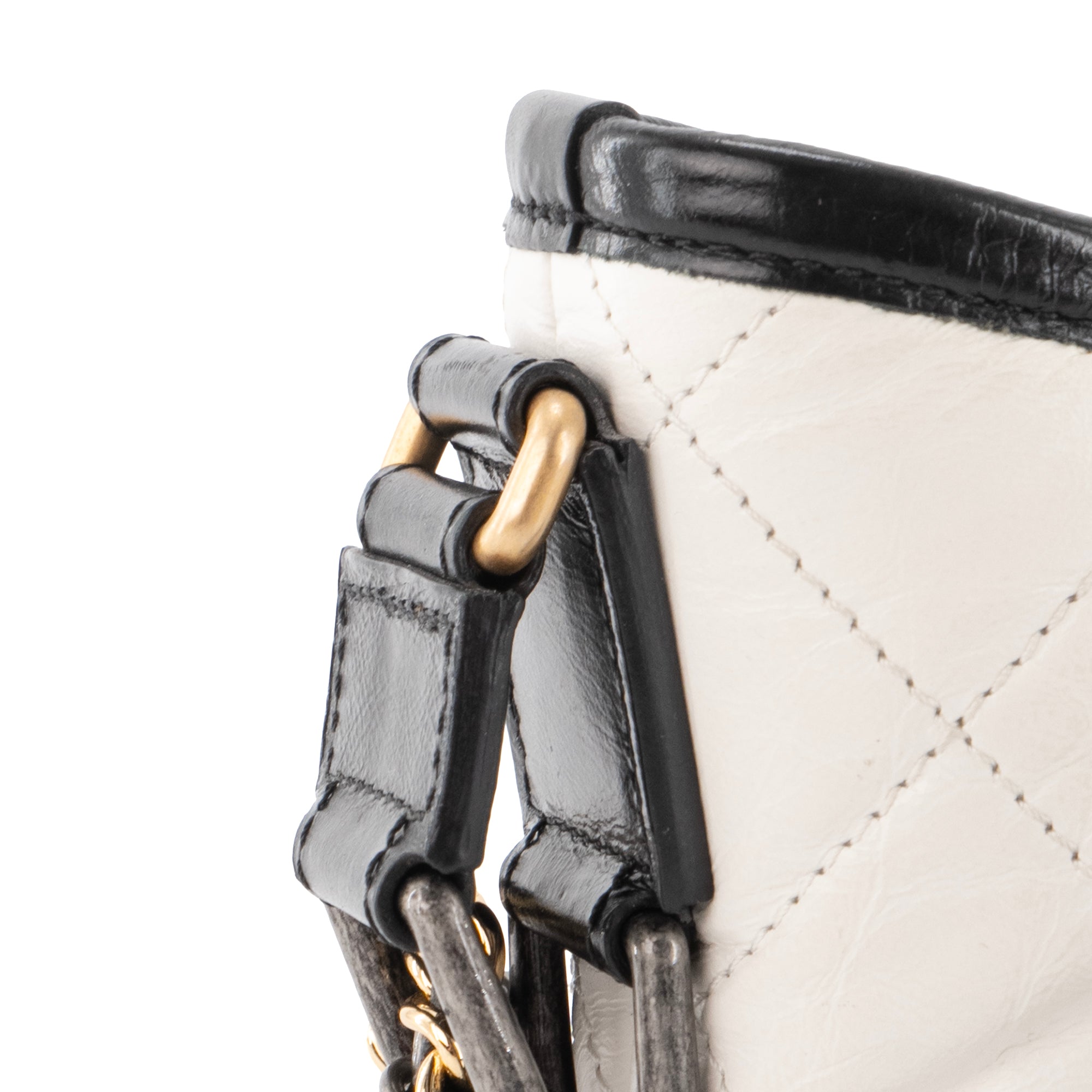 CHANEL - Sac à bandoulière Gabrielle mini Chanel en cuir bicolore noir et blanc