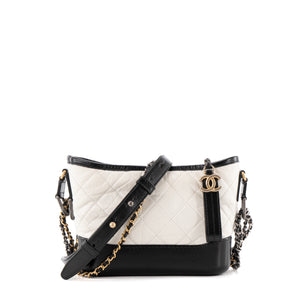 CHANEL - Sac à bandoulière Gabrielle mini Chanel en cuir bicolore noir et blanc