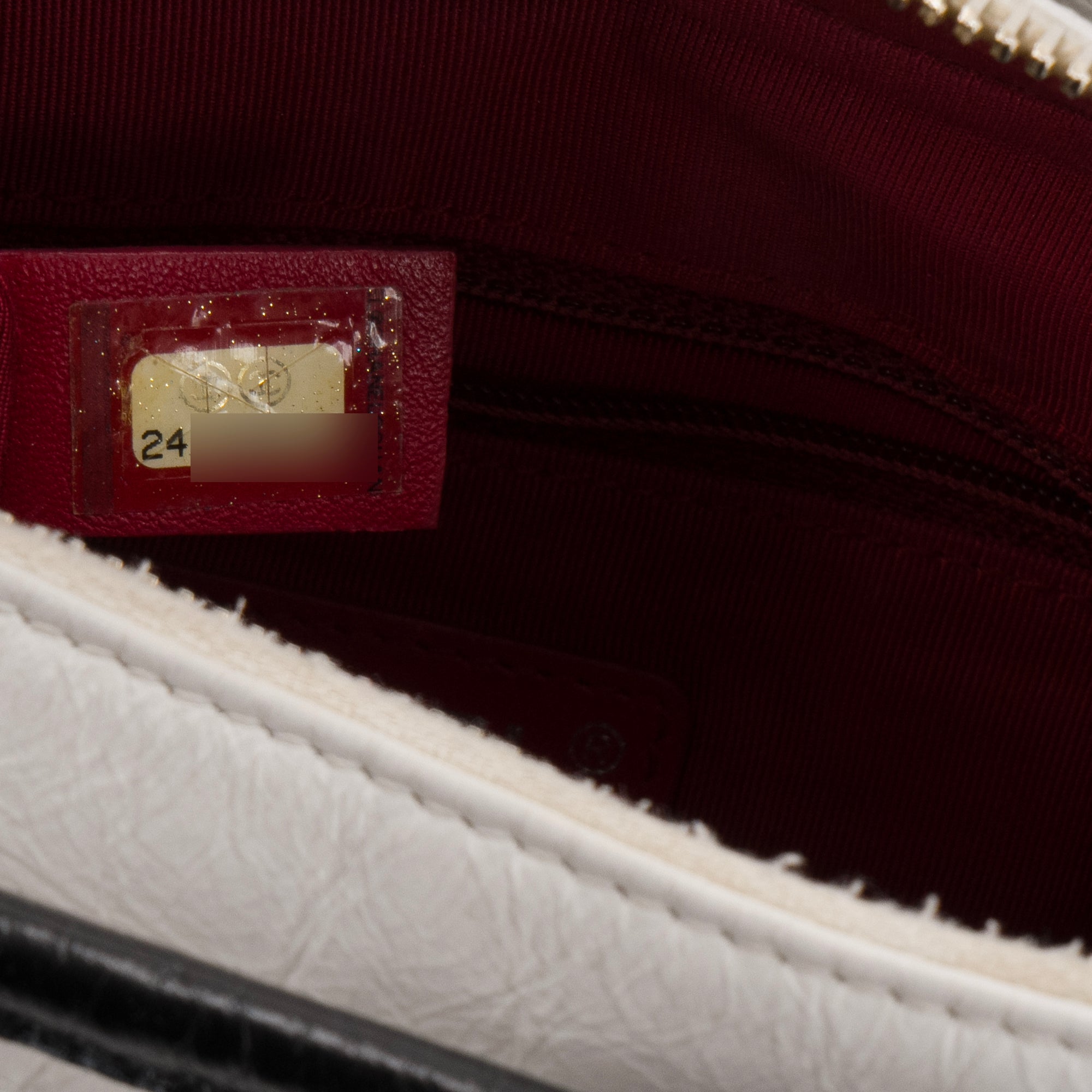 CHANEL - Sac à bandoulière Gabrielle mini Chanel en cuir blanc et noir