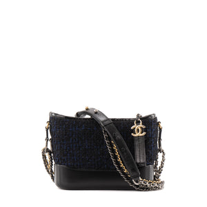 CHANEL - Sac à bandoulière Gabrielle mini Chanel en cuir bleu marine et tweed