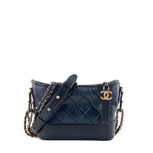 CHANEL - Sac à bandoulière Gabrielle mini Chanel en cuir bleu marine