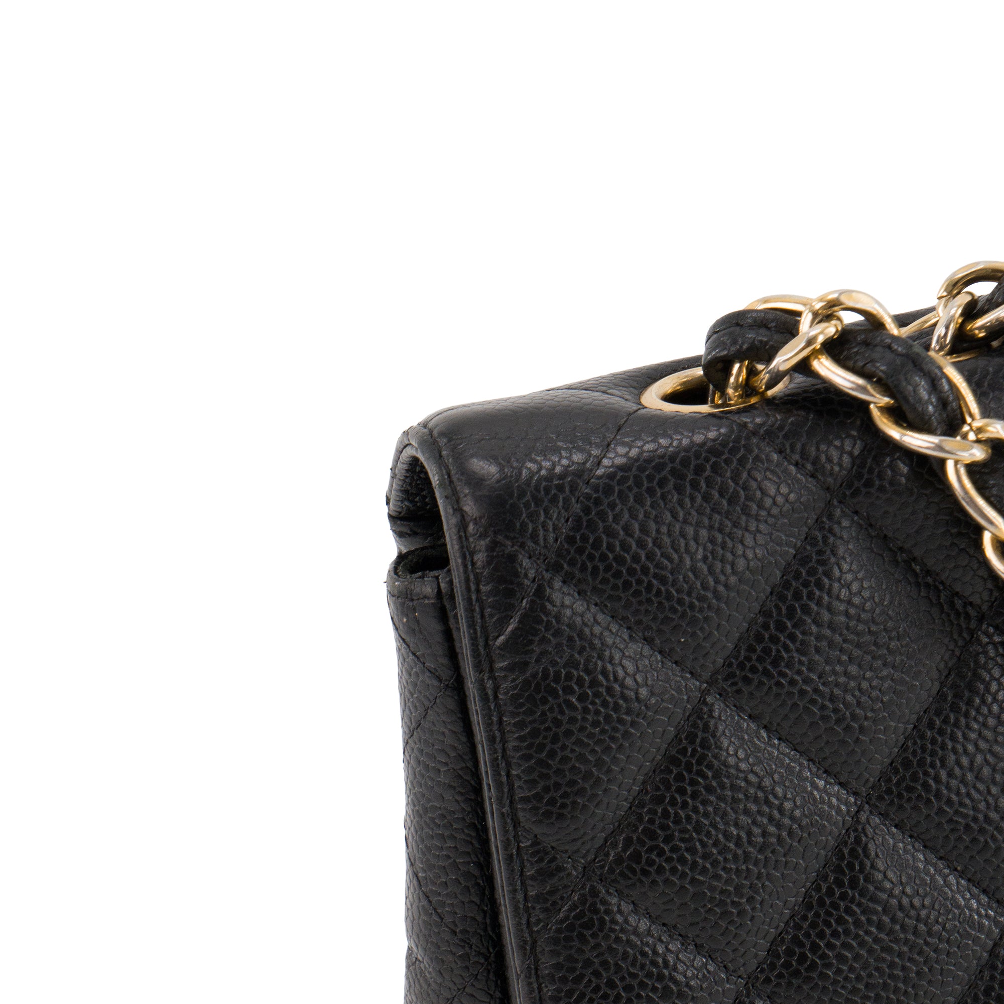 CHANEL - Sac à bandoulière Classique/Timeless Jumbo Chanel en cuir caviar noir
