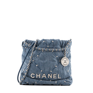 CHANEL - Sac à bandoulière Mini 22 Chanel en denim bleu et studs
