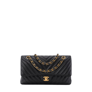 CHANEL - Sac à main Classique/Timeless 11.12 en cuir chevron noir