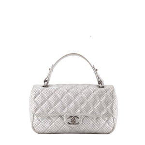CHANEL - Sac à épaule Classique/Timeless Chanel en cuir perforé argenté