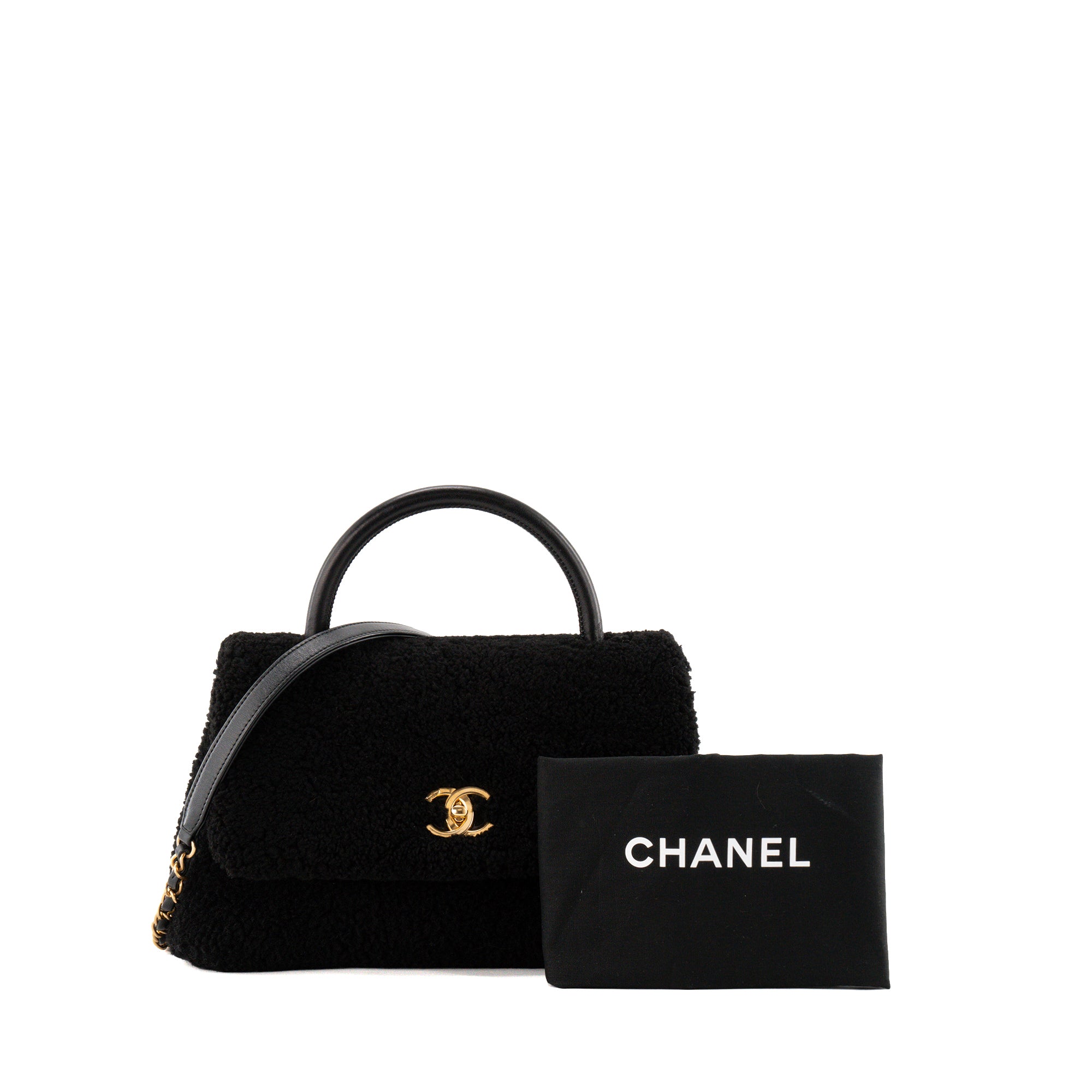 CHANEL - Sac à épaule Coco Handle Chanel en shearling et cuir noir