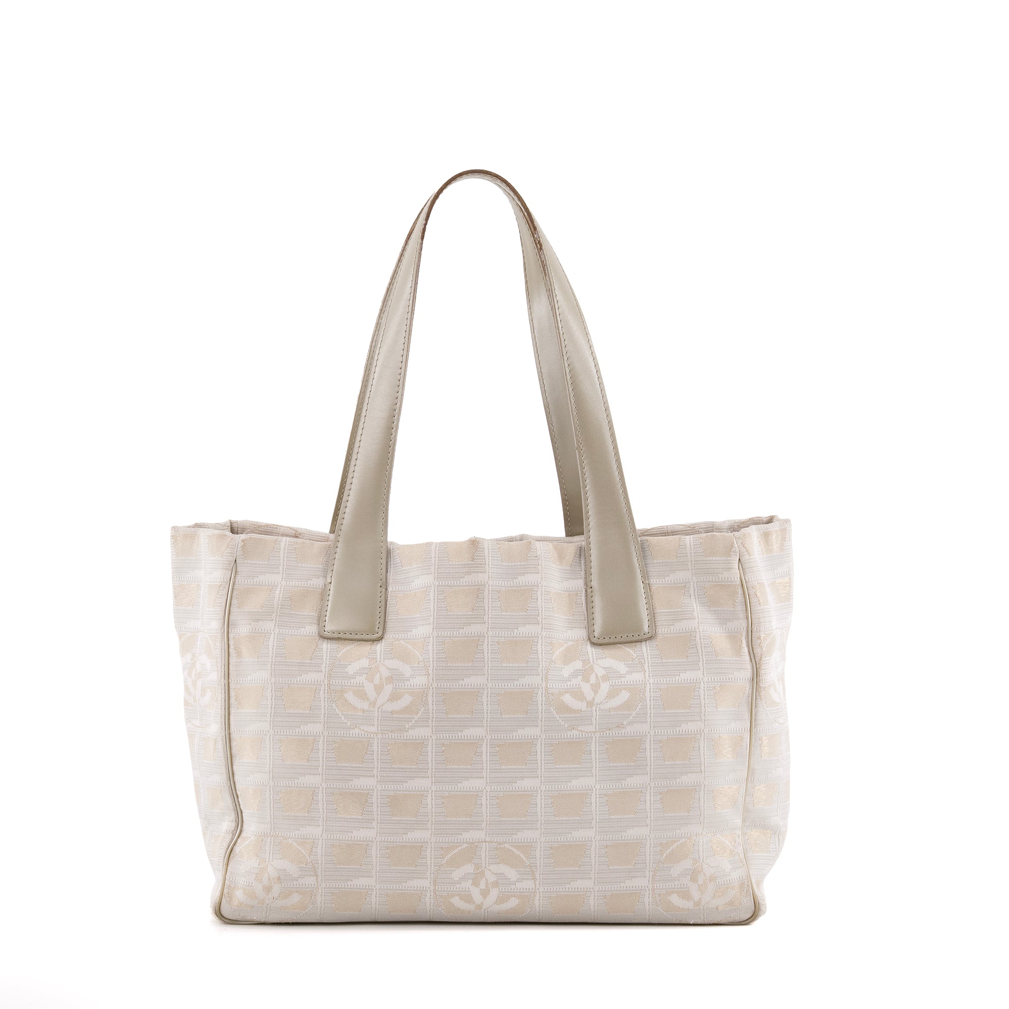 CHANEL - Sac cabas New Travel Line Chanel en toile blanche et dorée