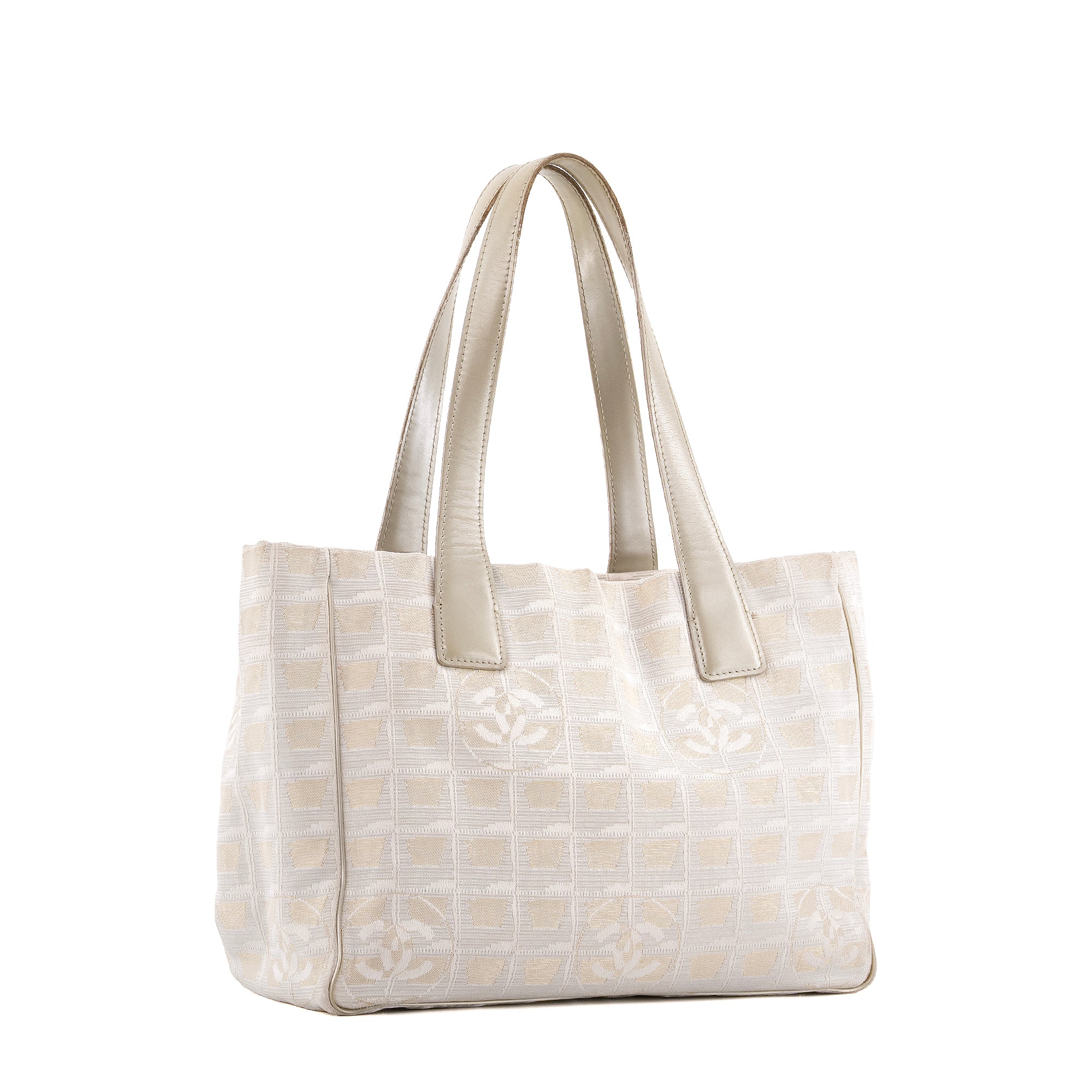 CHANEL - Sac cabas New Travel Line Chanel en toile blanche et dorée