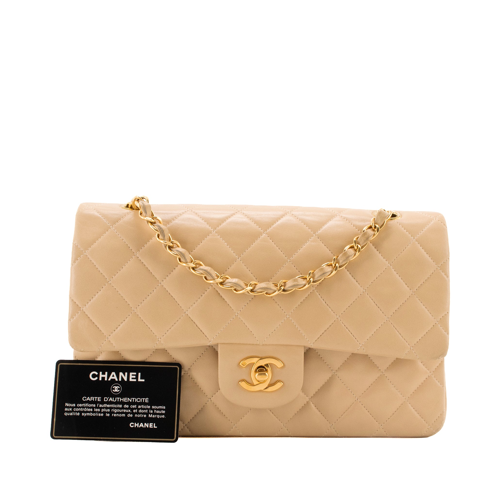 CHANEL - Sac à main Classique/Timeless 11.12 Chanel en cuir lisse beige vintage