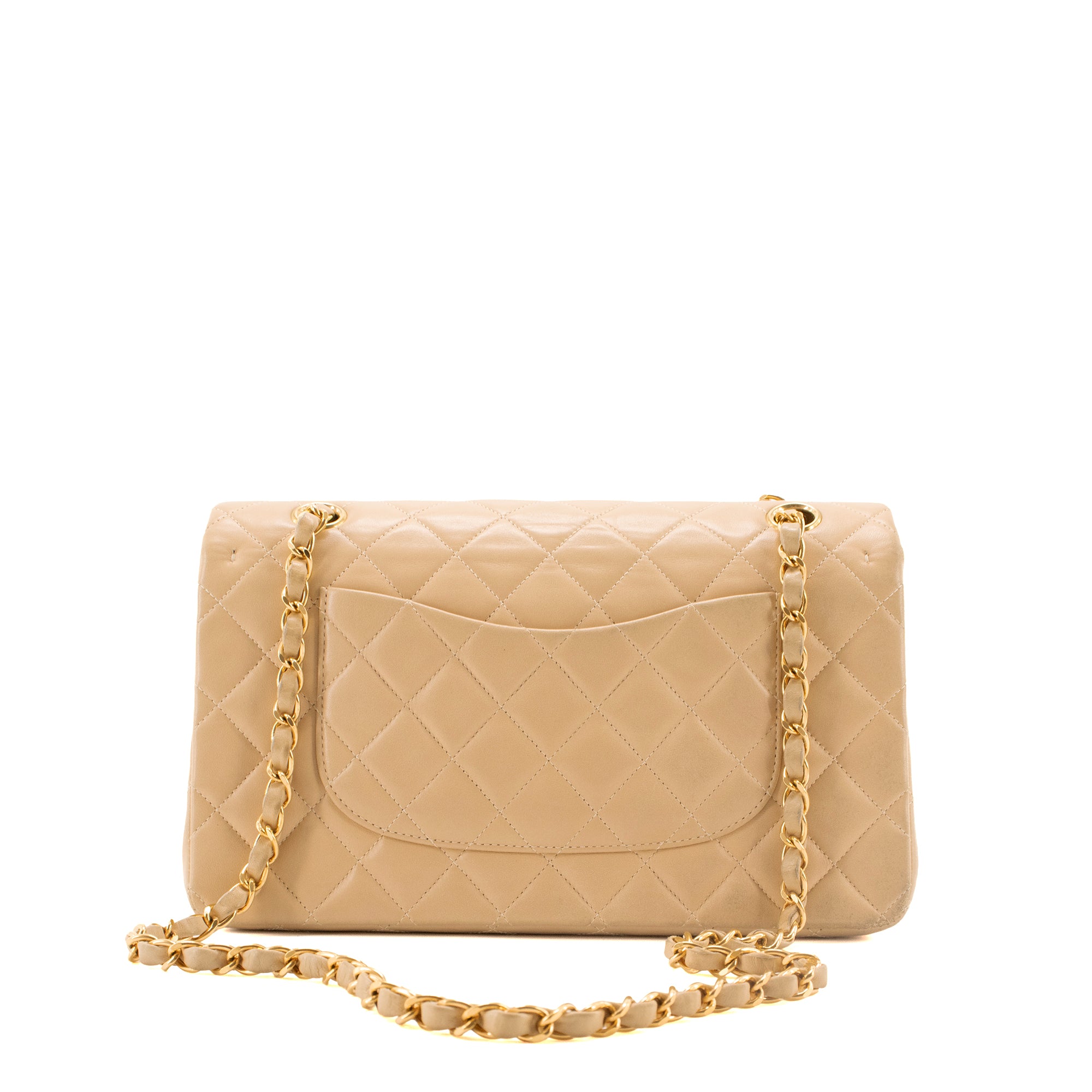 CHANEL - Sac à main Classique/Timeless 11.12 Chanel en cuir lisse beige vintage