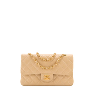CHANEL - Sac à main Classique/Timeless 11.12 Chanel en cuir lisse beige vintage