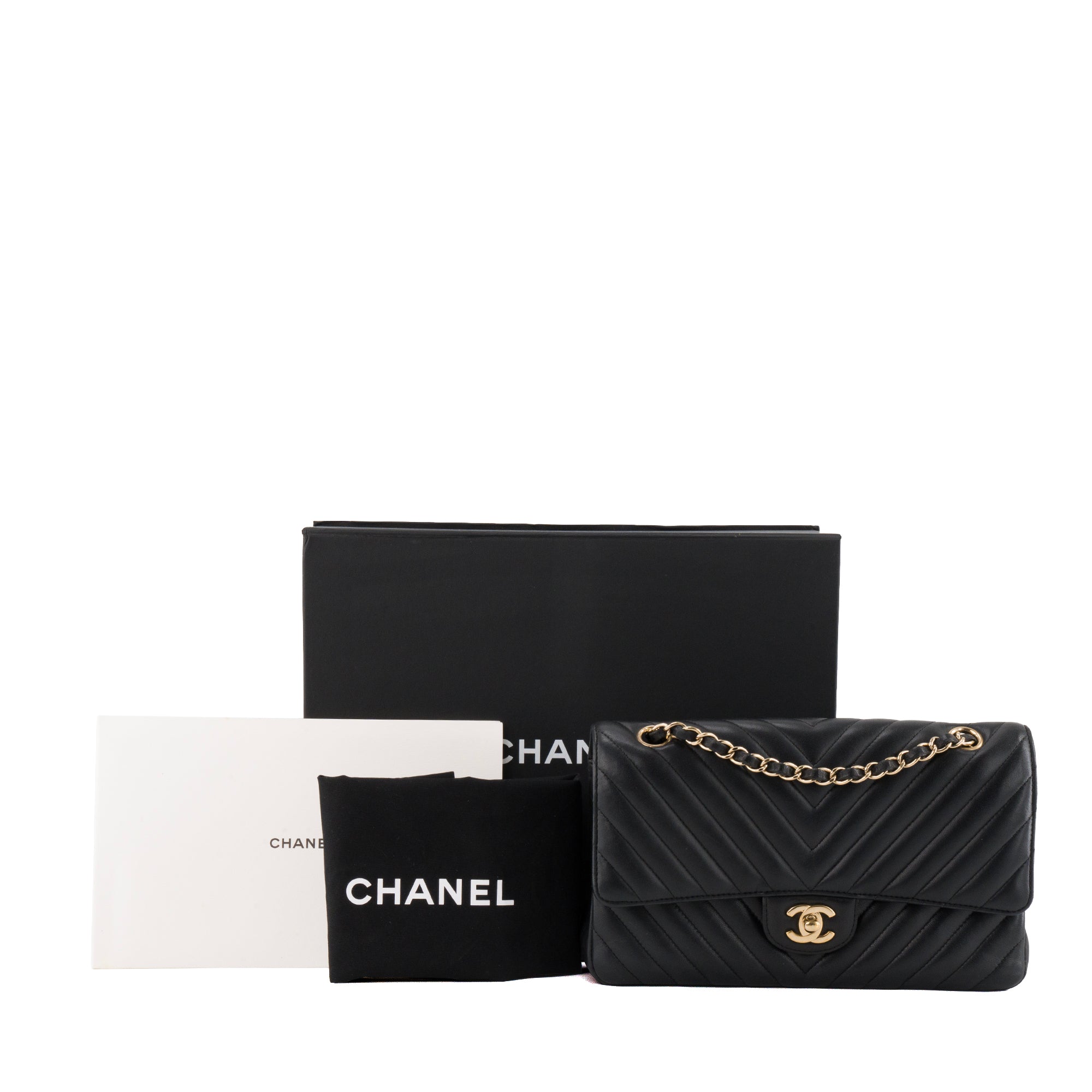 CHANEL - Sac à main Classique/Timeless 11.12 Chanel en cuir lisse chevron noir